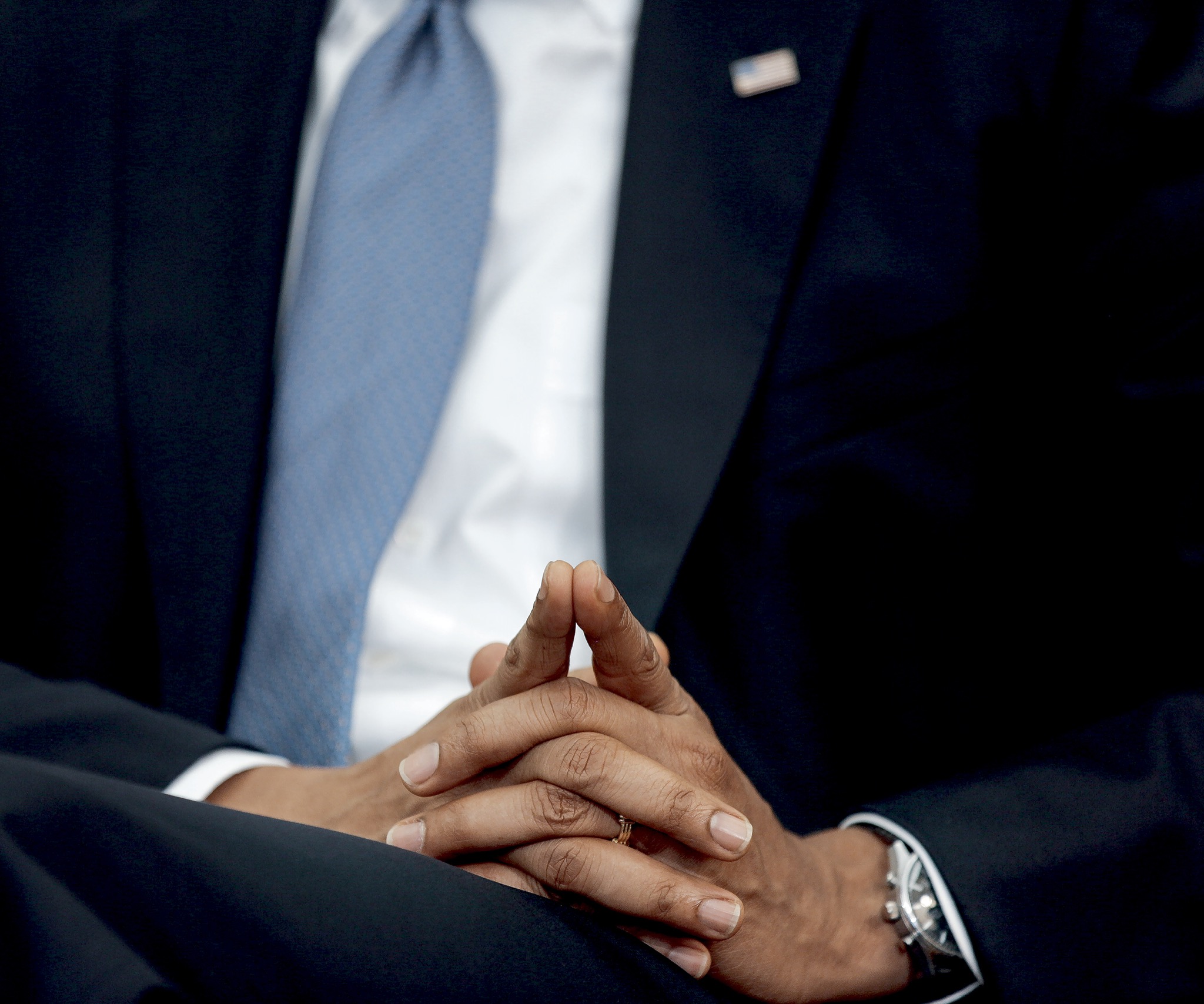 A tight shot of President Obamas hands during a QA with the White House press - photo 7