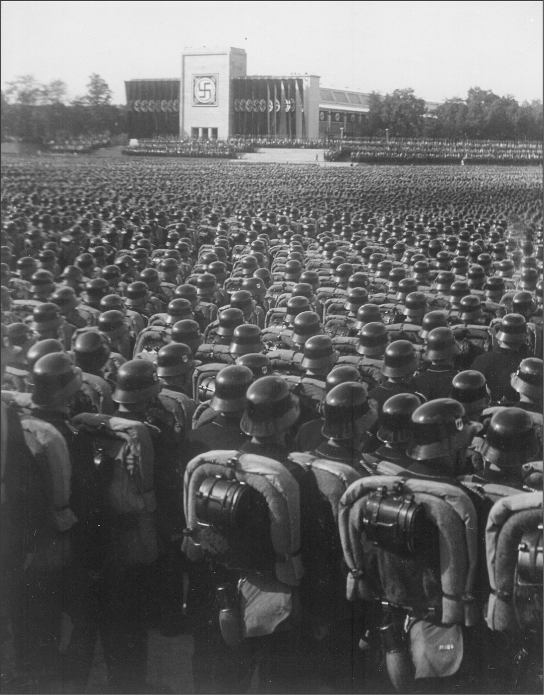 German soldiers watching Hitler speak at a rally in Nuremberg 1935 Now the - photo 3