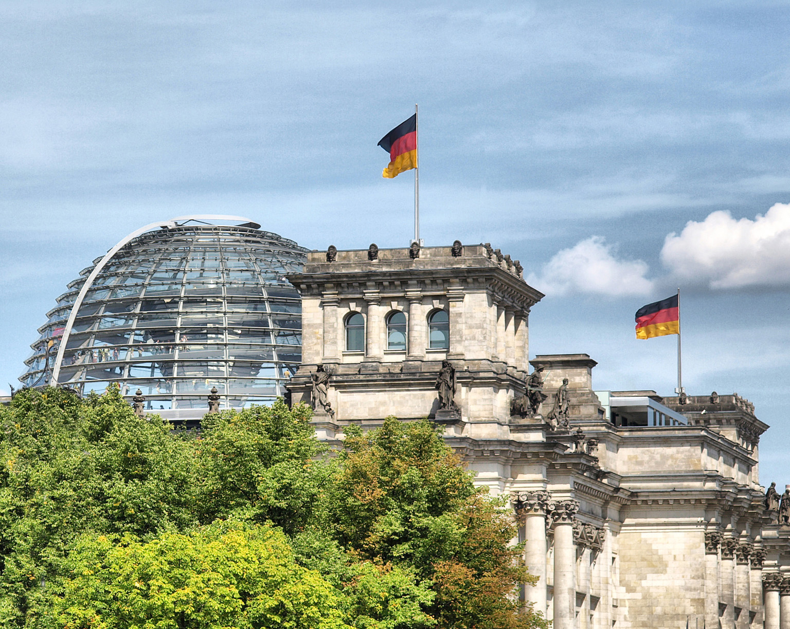 The Reichstag one of Berlins most symbolic buildings is a popular sight - photo 13