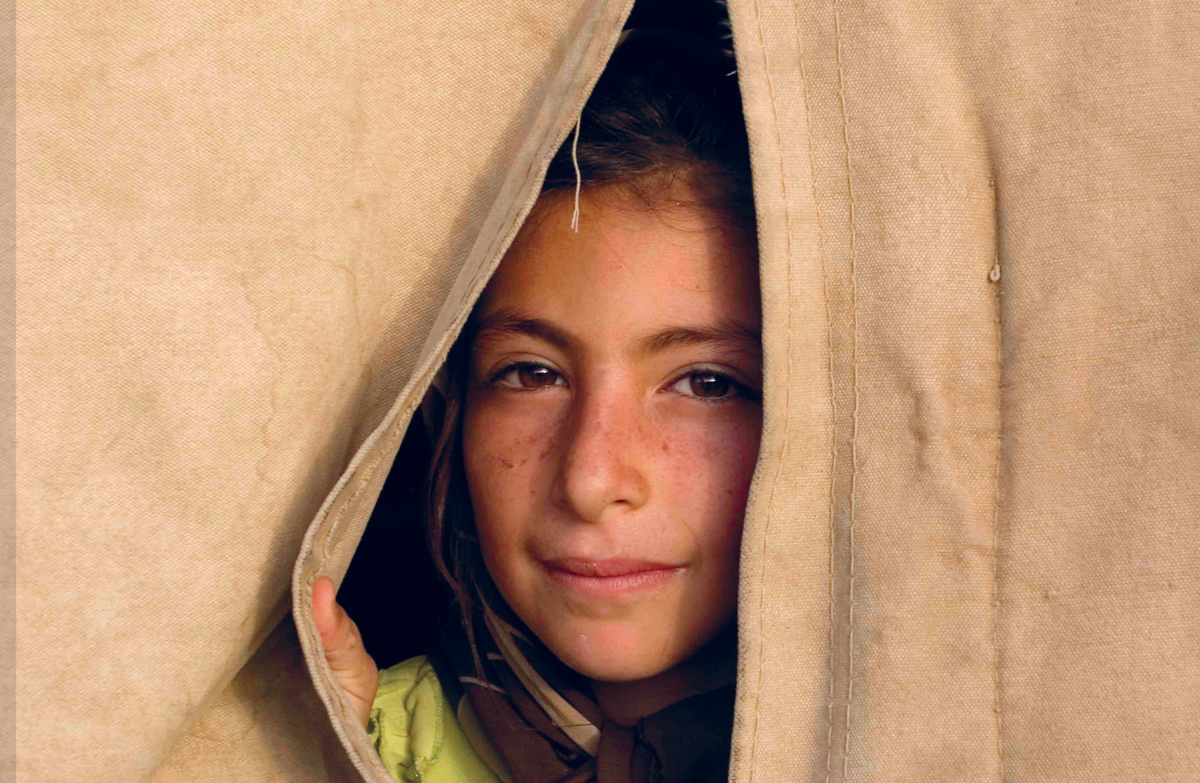 A Qashqai nomad girl looks out from her familys tent ZagrosMountains ANDREW - photo 3