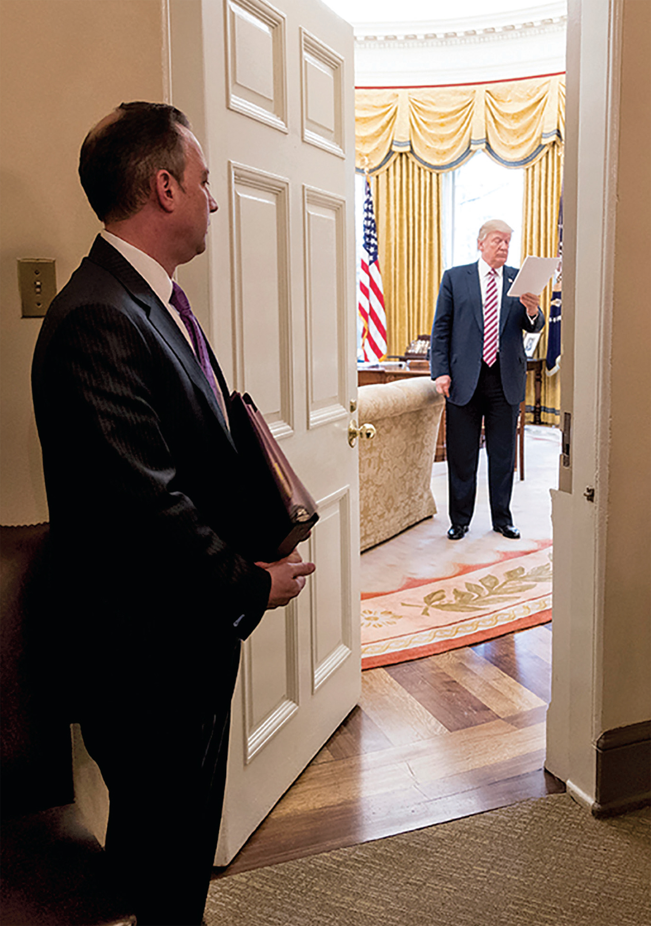 March 10 2017 Chief of Staff Reince Priebus peers into the Oval Office as - photo 16