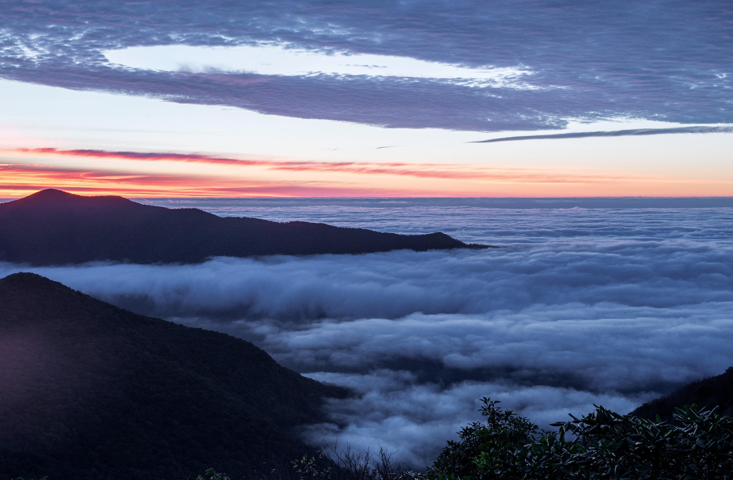 The sun rises over the foggy Blue Ridge Mountains of Western North Carolina - photo 5