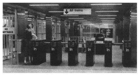 A passenger deposits her token and joins millions of other passengers who daily - photo 2