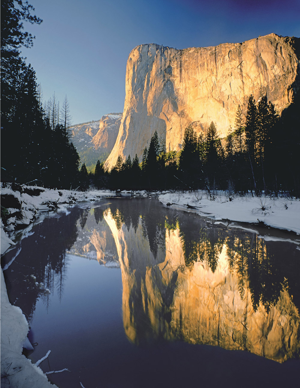 A very wide-angle view shows a winter reflection of El Capitan in the Merced - photo 13