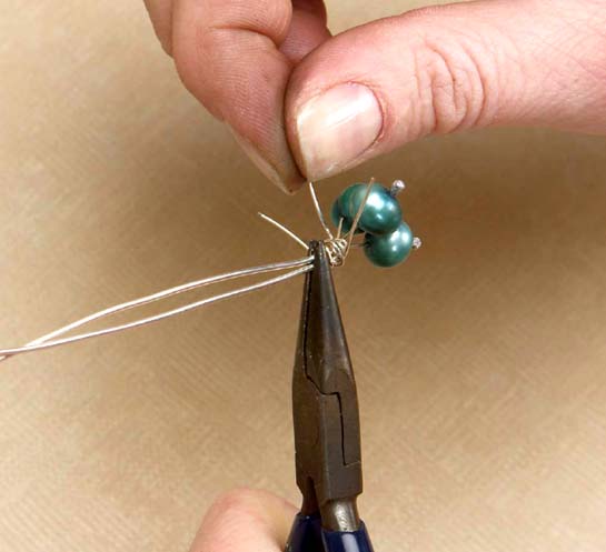 STEP 3 Secure the Eggs Wrap each pearl wire around the folded wire just below - photo 9