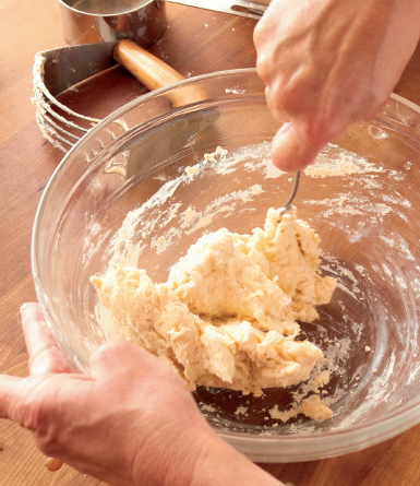 coming together after adding water what kneaded pie dough looks like - photo 11