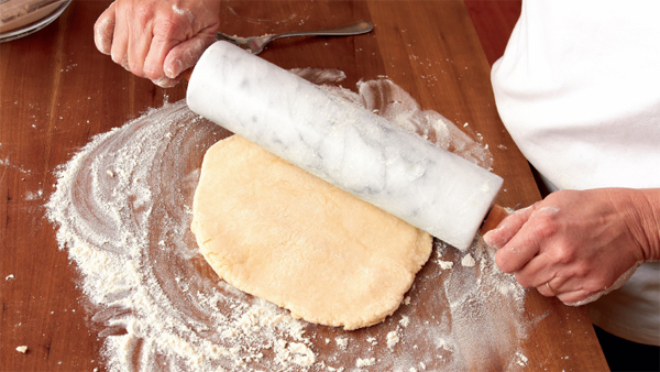 rolling out the dough To roll out the dough sprinkle the flat work surface - photo 13