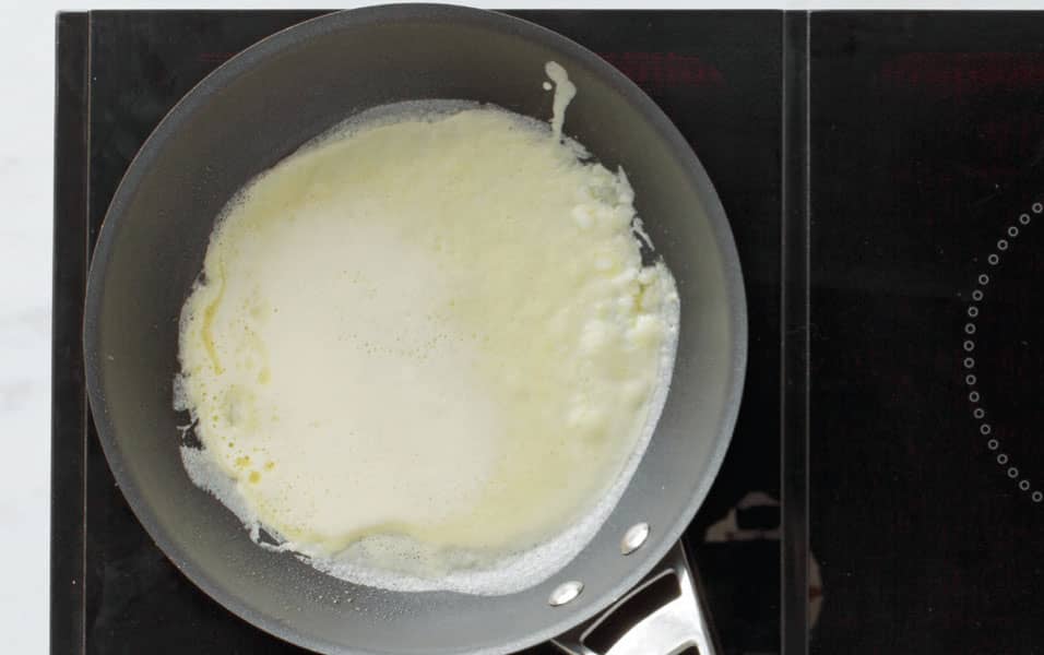 Pour 3 to 4 tablespoons 45 to 55 g of the batter into the pan and swirl to - photo 9