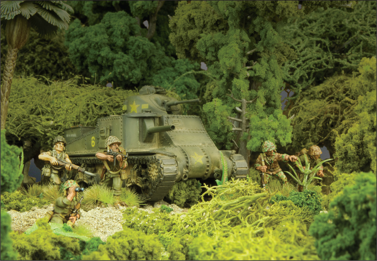 US Marines burst from the jungle supported by an M3 Lee PRELUDE The - photo 5