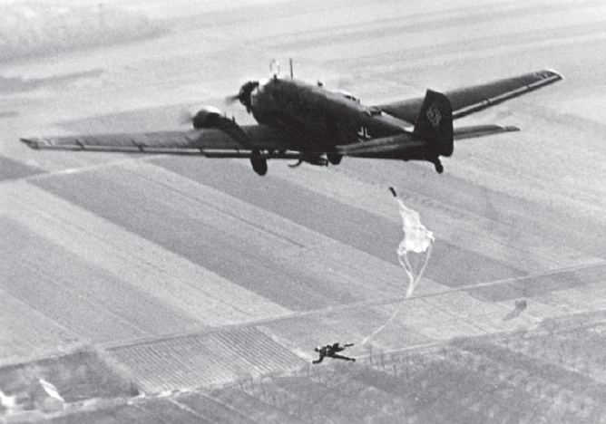A Fallschirmjger makes a static-line parachute jump from a Ju 52 transport - photo 3