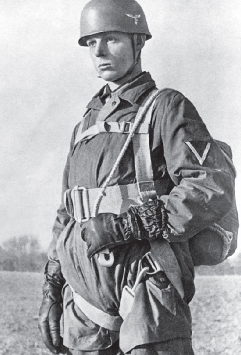 This close-up of a German paratrooper illustrates the typical jump kit of the - photo 5