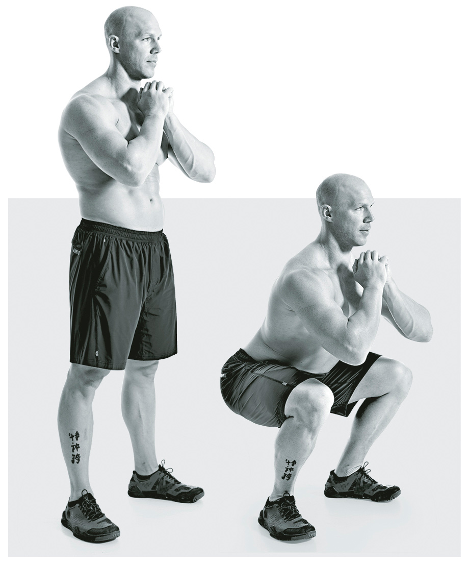 Air Squat Hold Stand with your feet slightly wider than shoulder-width apart - photo 1