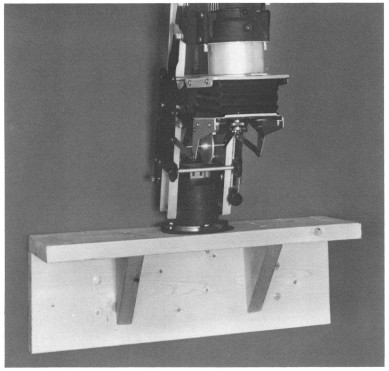 An enlarger wall mount is a sturdy shelf attached to the wall to hold your - photo 5