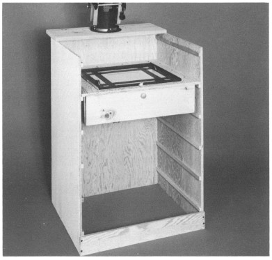 An adjustable enlarger baseboard has a narrow shelf for mounting your enlarger - photo 6