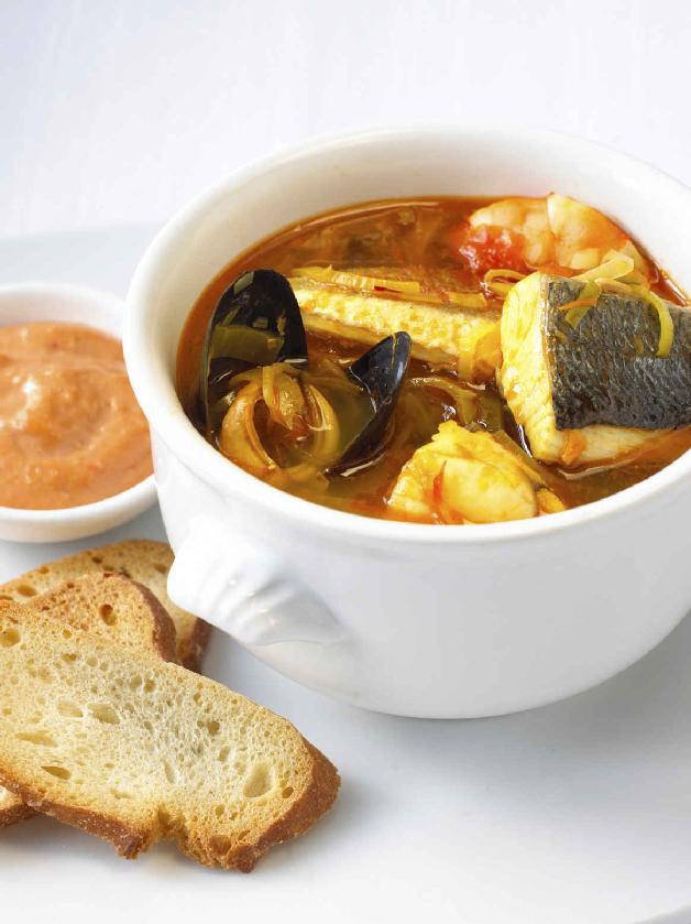 Bouillabaisse Originally nothing more than a humble fishermans soup using the - photo 9