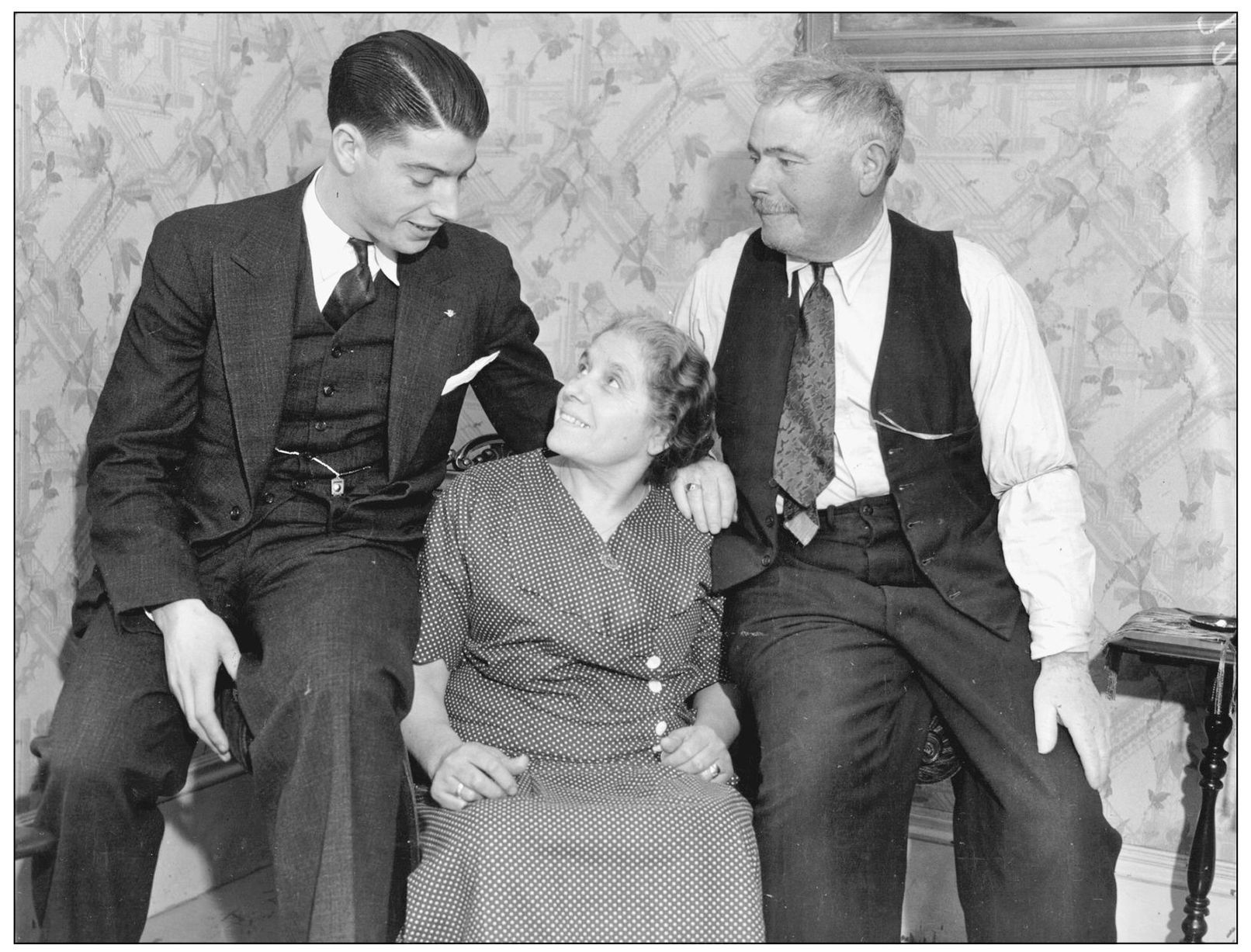 Baseball great Joe DiMaggio is pictured with his parents in February 1936 In - photo 3