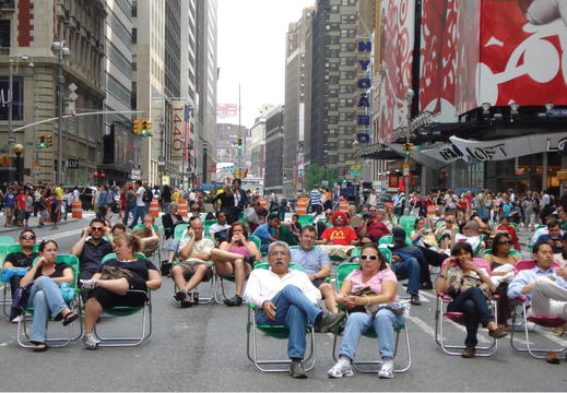 Cheap lawn chairs and orange traffic barrels were used to test the temporary - photo 3