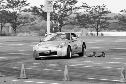 The Team Pacos Parts House 350Z out on the autocross track Photograph by Clyde - photo 2