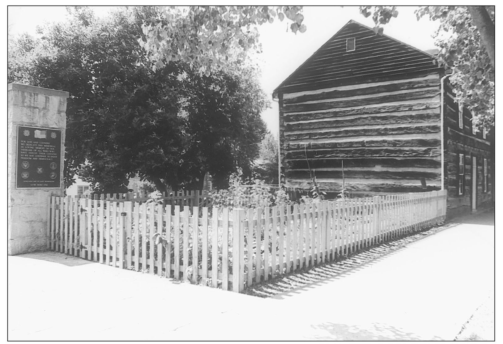 Harper Cabin sits on Main Street in its condition in 1920 and in 2000 - photo 9