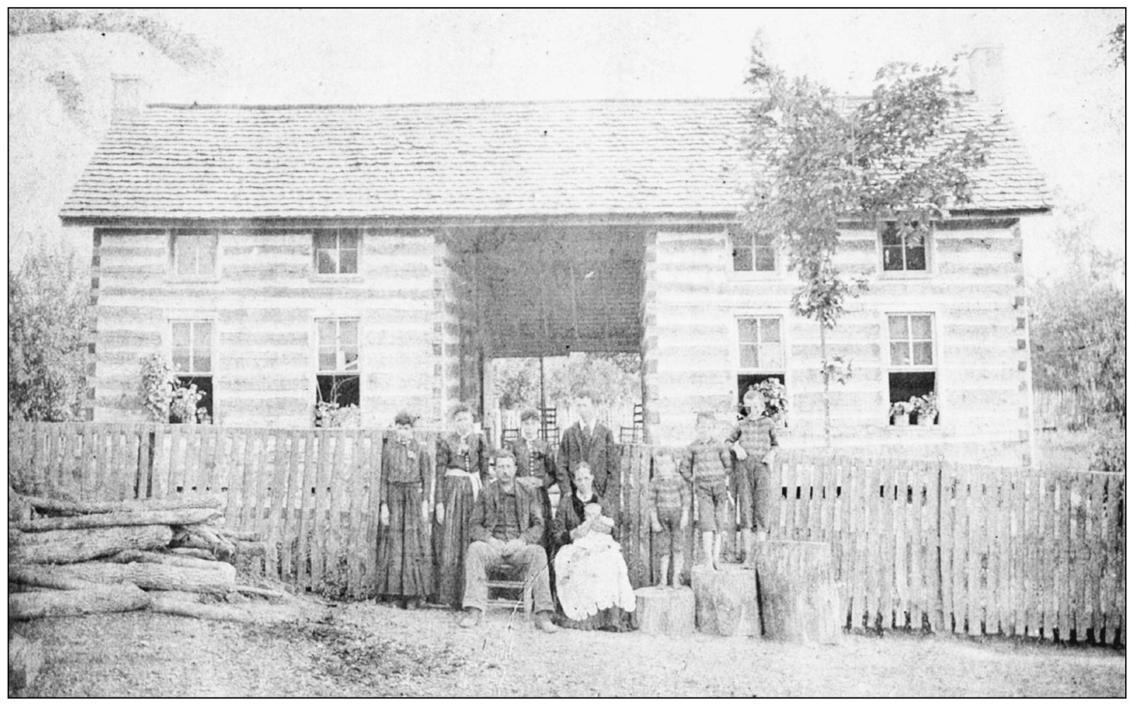 ONCE IN A LIFETIME An unidentified family gathers for a photograph in front of - photo 6