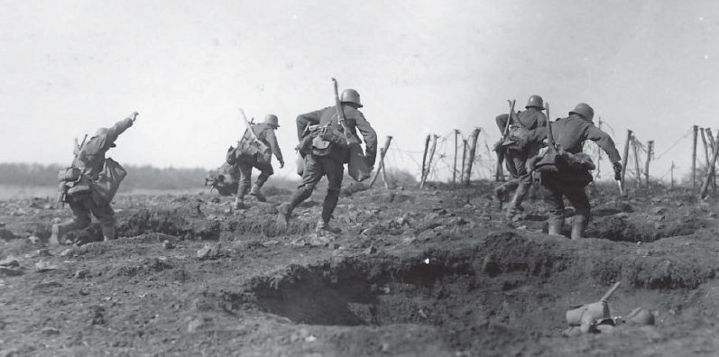 A German Handgranatetrupp hand-grenade team rushes across no mans land with - photo 4