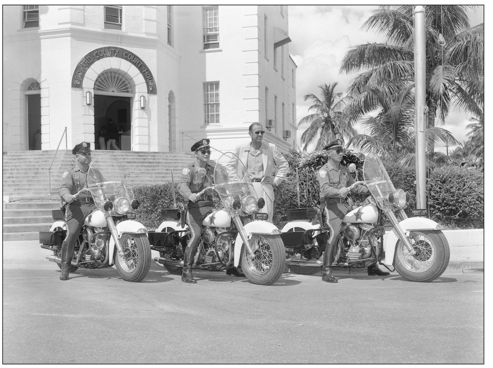 Broward Sheriffs Department motorcycle deputies pose in front of the c 1928 - photo 4