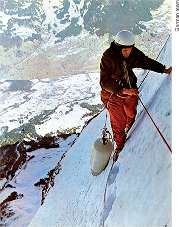 Golikow carries a supply bomb on the Second Icefield Bonington and camera - photo 18