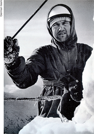 Schnaidt looks into the Germans ice cave at the Death Bivouac Kor stands in - photo 25