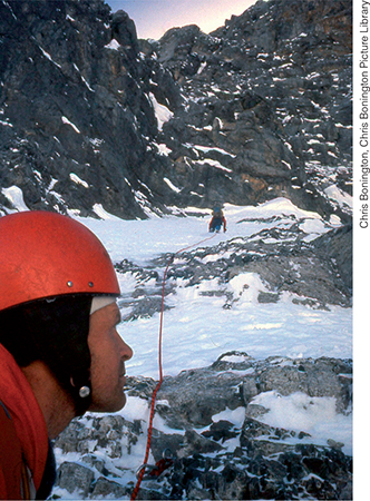 Harlin watches as Haston climbs the Second Icefield on 9 March Strobel - photo 28