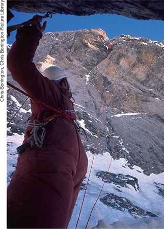 Golikow watches Kor climbing above the Central Pillar on 20 March the same - photo 33