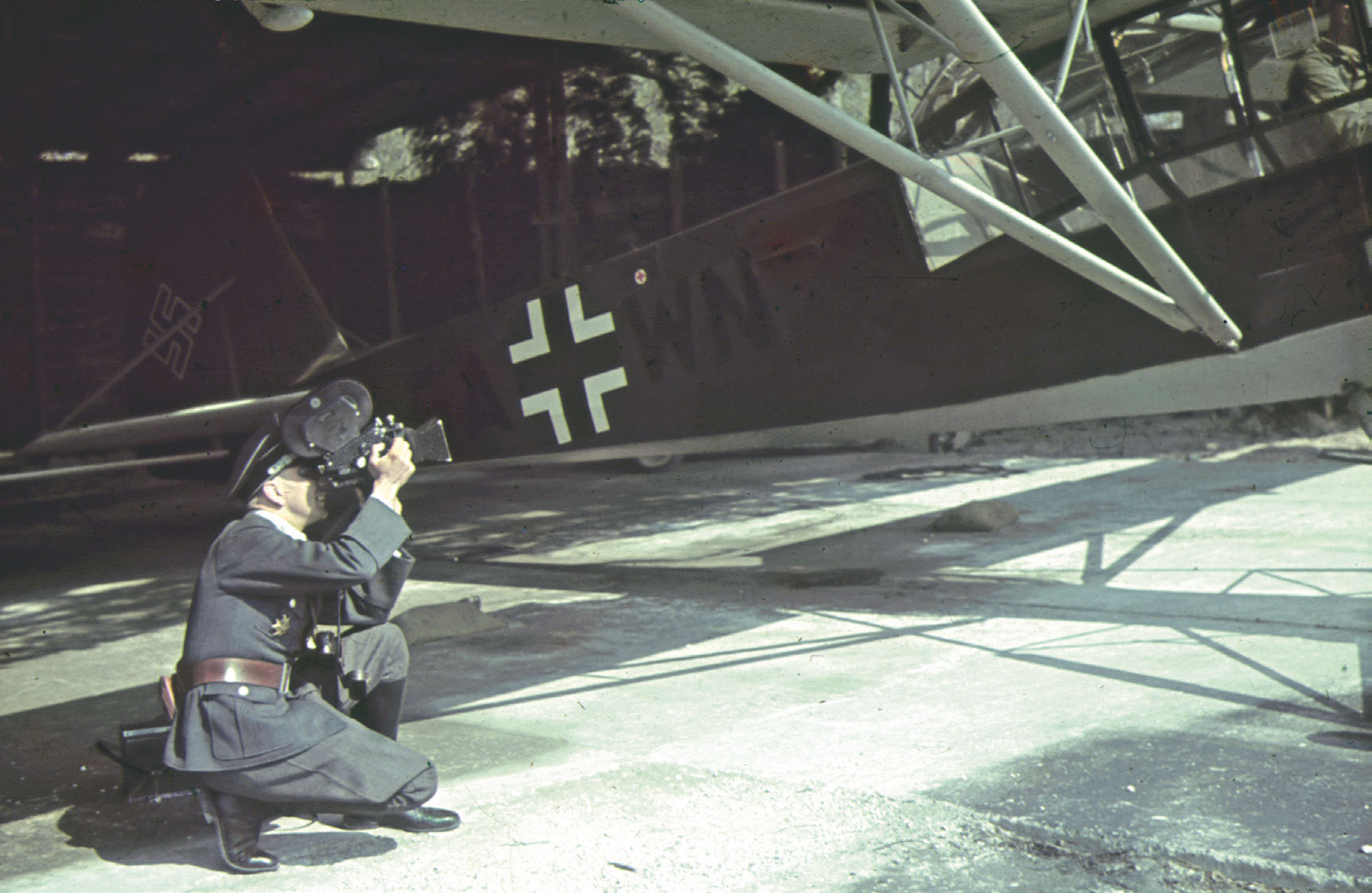 War correspondent Richter filming the pilot of a Fieseler Storch preparing to - photo 5