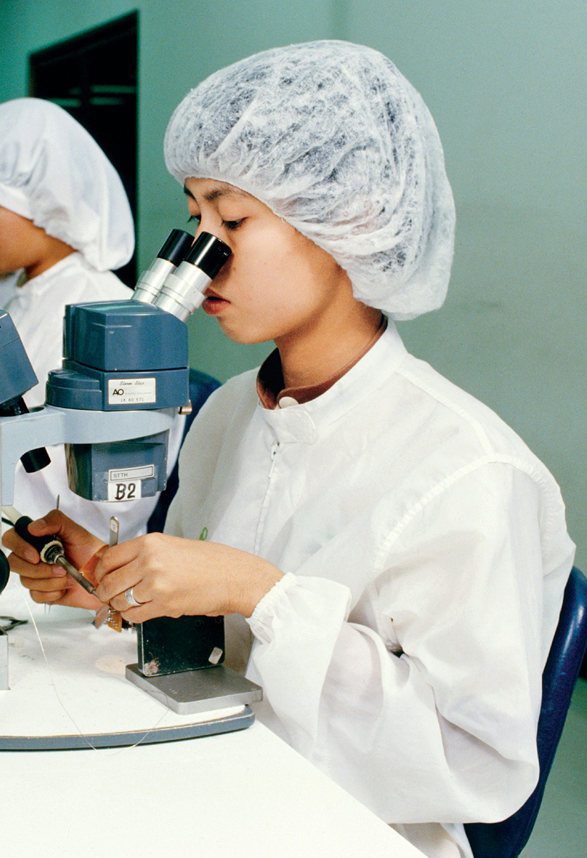 opposite A scientist in a biotech laboratory Thailand c 1987 previous - photo 12