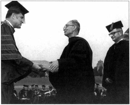 Seymour Lubetzky receives his honorary degree from then-Chancellor Charles E - photo 2