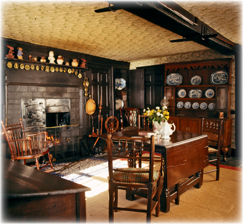 The entrance hall at Hill Top doubles as a kitchen with a stone-flagged floor - photo 5