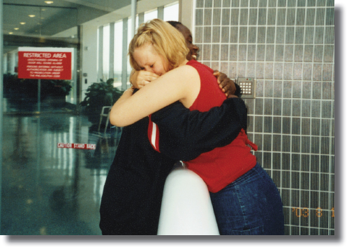 We greet each other for the first time in person with a big hug over the - photo 13