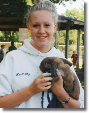 In June 2001 I was a camp counselor Here I am with Louis the rabbit - photo 9