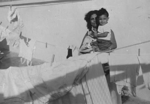 On the rooftop of the family building in Aden in 1965 Safia holds me tight - photo 3