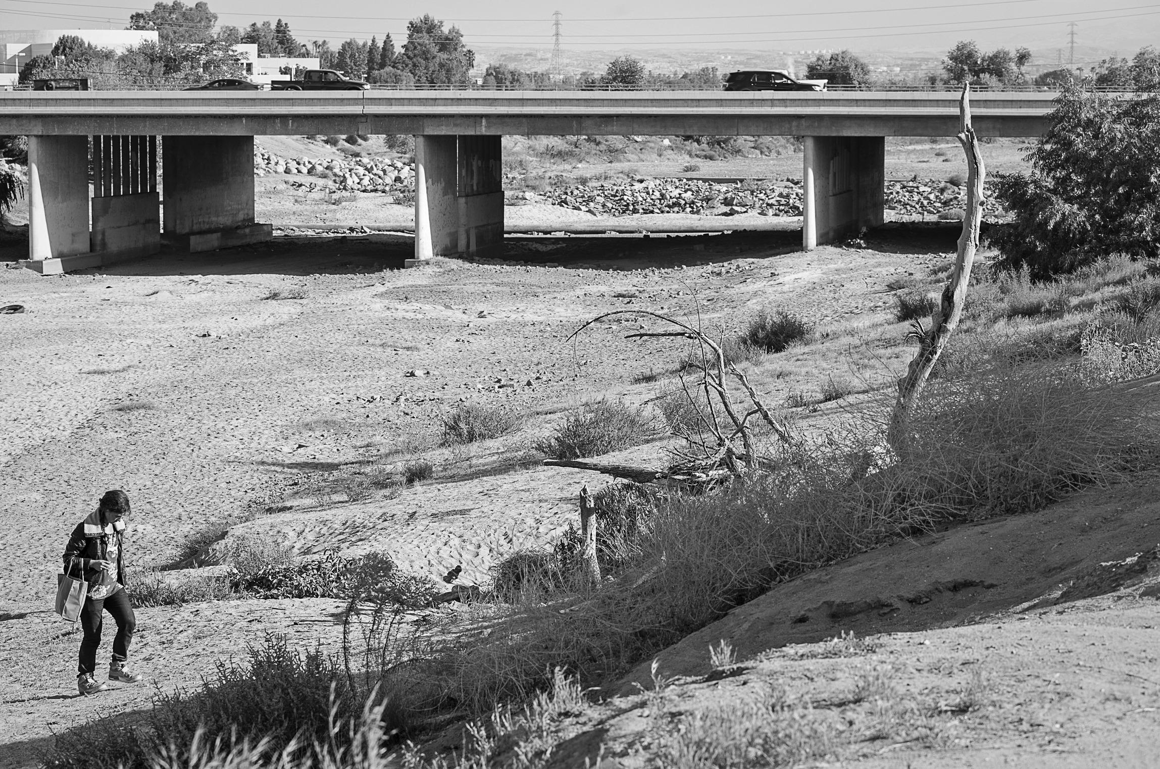 Kern River dry as a bone slices through Bakersfield On a summer day in the - photo 4