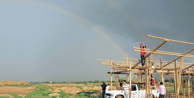 Community members of San Pedro Apstol in Oaxaca Mexico help construct a - photo 5