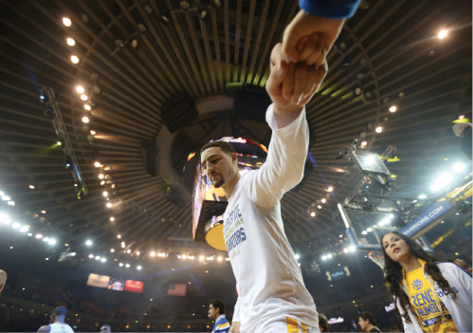 Klay Thompson fist bumps a fan prior to Game 1 of the NBA Finals in which he - photo 5