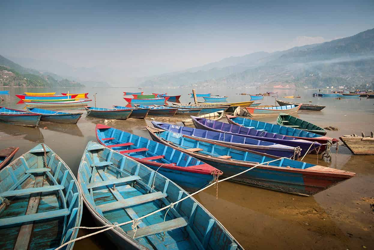 Pokhara Pokharas lakeside is the perfect place to relax after the rigours of a - photo 9