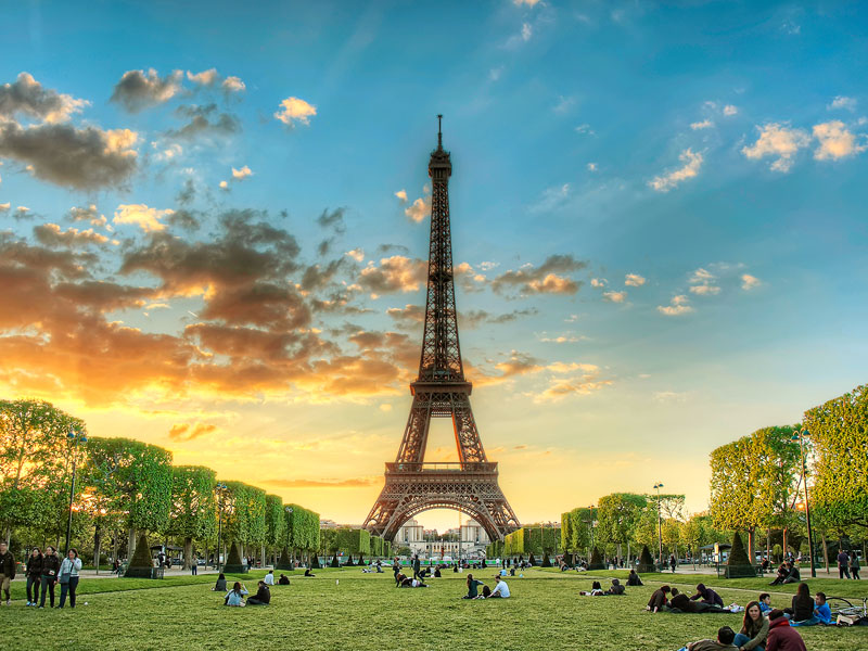 Eiffel Tower at dusk DANIEL CHUIGETTY IMAGES PARIS If ever a city needed no - photo 9