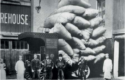 A Leyland laden with bags of wool stands outside Fox Bros cloth mill much of - photo 5