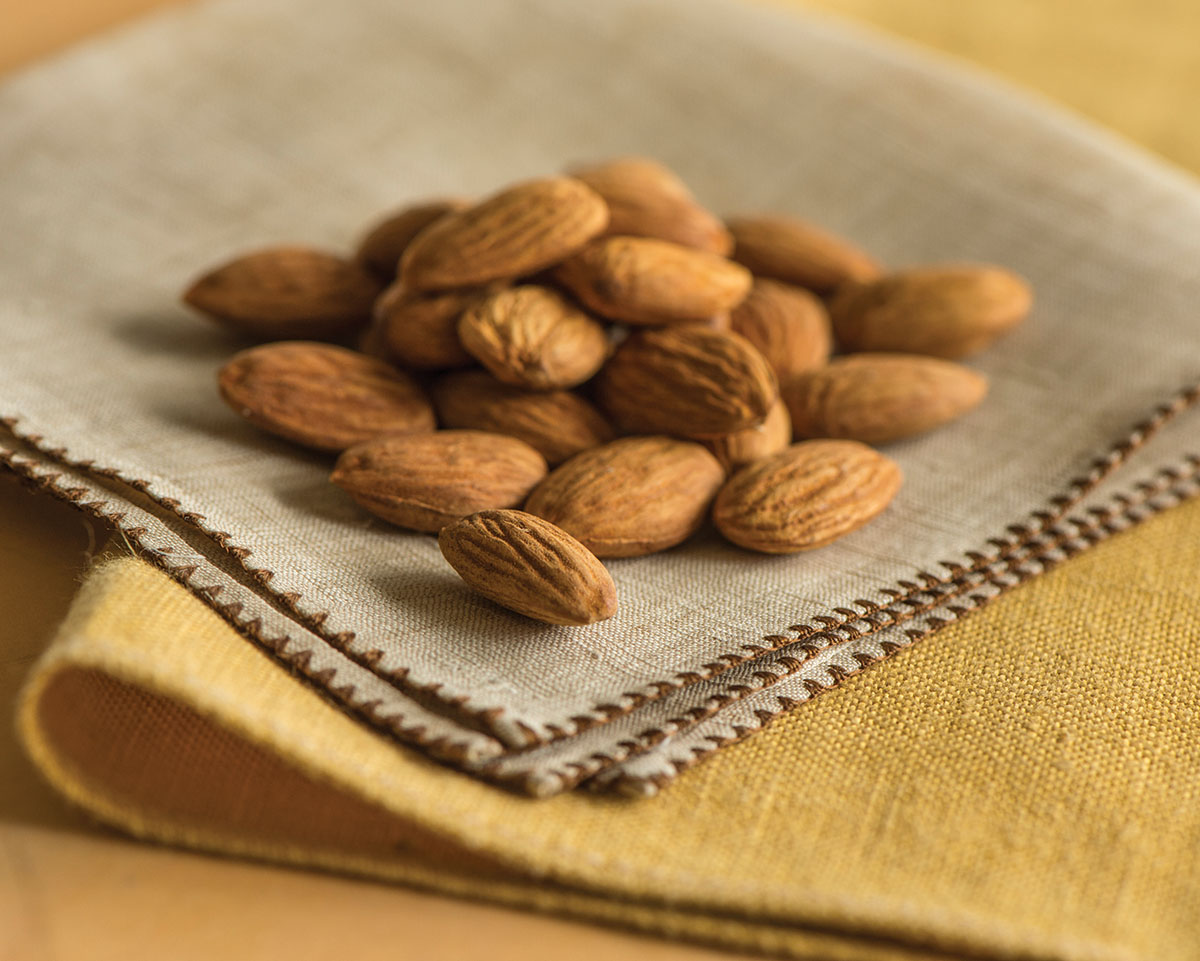 Many years after all those first tastes of almonds I visited an almond orchard - photo 5