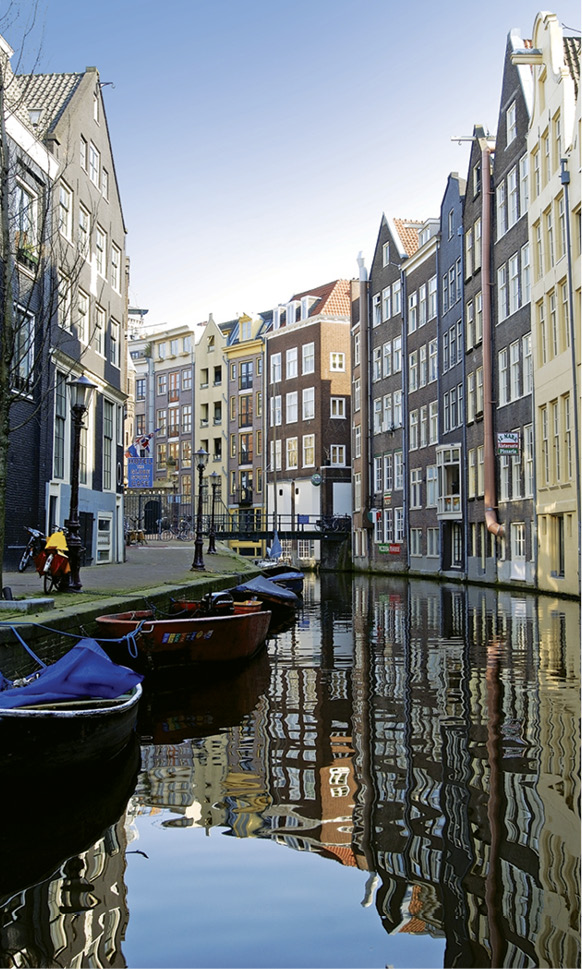 A canal in Amsterdam see The Americas The American Queen see is a - photo 14