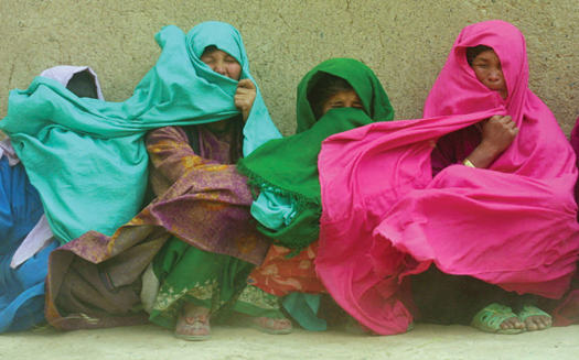 Hazara women in the town of Bamian are caught by a strong gust of wind The - photo 4