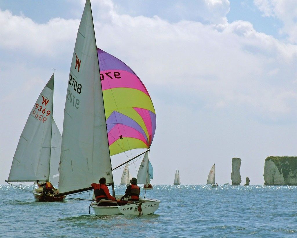 A fleet of Wayfarers rounds Old Harry rock near Swanage Beyond the shallows - photo 4