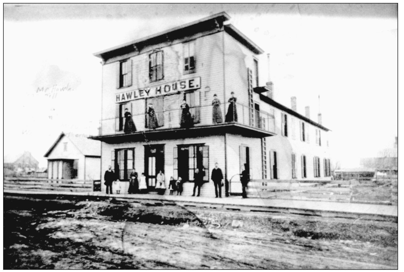 Pictured here is the Hawly House at 216 East Fifth Street in 1886 Located just - photo 7