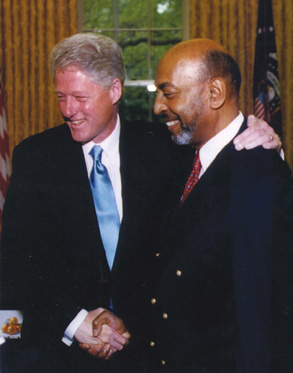 My father receiving a presidential pardon from Bill Clinton following a - photo 13