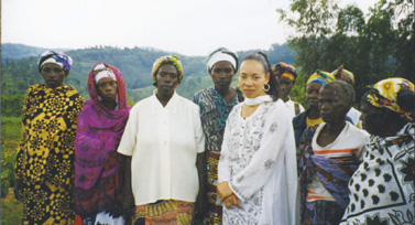 With survivors at the genocide site in Rwanda that I visited in March 1998 - photo 25